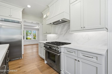 Experience exceptional luxury in this custom-built luxury - photo 10