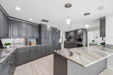 Set along 90 feet of deep-water frontage in the coveted Venetian - photo 4