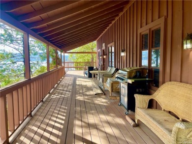 Secluded cabin overlooking Bass Lake on a half-acre lot. - photo 2