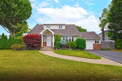 Charming Center-Hall Cape Cod Nestled on Serene Tree-Lined - photo 1