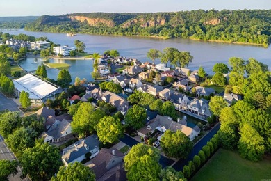 Nestled just off the Arkansas River in a desirable gated - photo 3