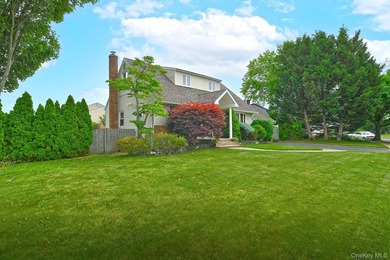 Charming Center-Hall Cape Cod Nestled on Serene Tree-Lined - photo 3