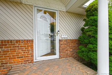 Charming Center-Hall Cape Cod Nestled on Serene Tree-Lined - photo 4