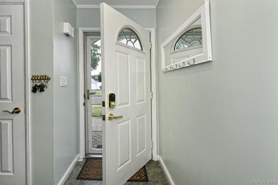 Charming Center-Hall Cape Cod Nestled on Serene Tree-Lined - photo 5