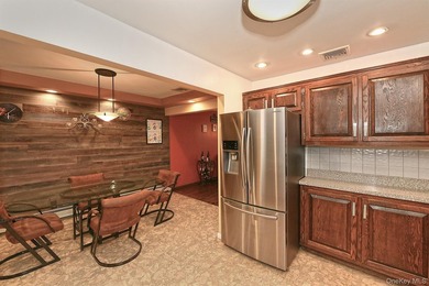 Charming Center-Hall Cape Cod Nestled on Serene Tree-Lined - photo 10