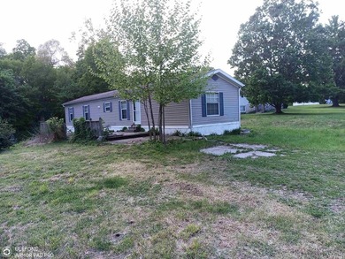 Near Lake Monroe - Proximity to I-69 streamlines access. One - photo 1