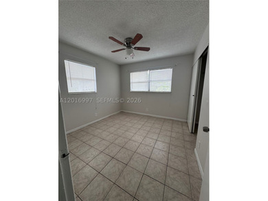 Three bedroom two bath is an corner unit with a washer and dryer - photo 5