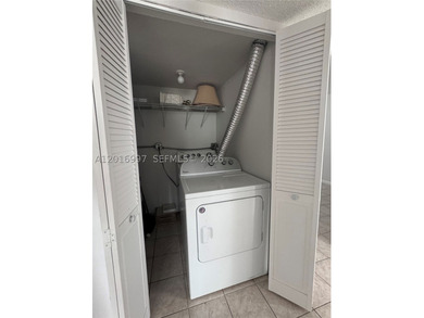 Three bedroom two bath is an corner unit with a washer and dryer - photo 6