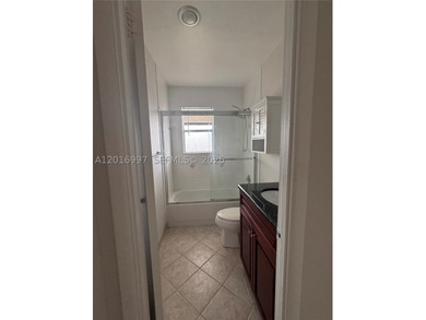 Three bedroom two bath is an corner unit with a washer and dryer - photo 8