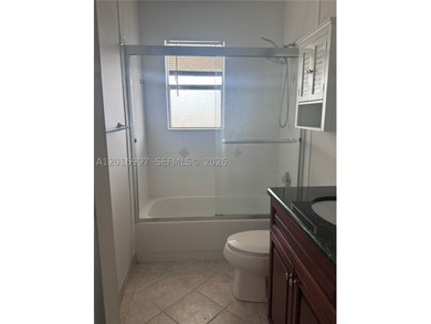 Three bedroom two bath is an corner unit with a washer and dryer - photo 9