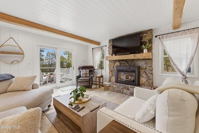 Set on 10+ acres with a beautiful view of Lake George, this - photo 5