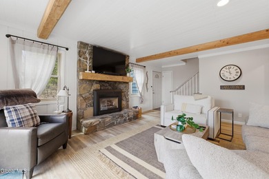 Set on 10+ acres with a beautiful view of Lake George, this - photo 6
