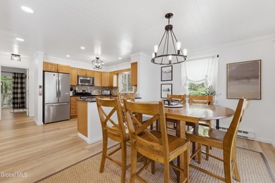 Set on 10+ acres with a beautiful view of Lake George, this - photo 8