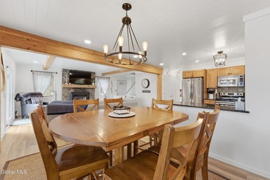 Set on 10+ acres with a beautiful view of Lake George, this - photo 9