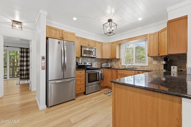 Set on 10+ acres with a beautiful view of Lake George, this - photo 10