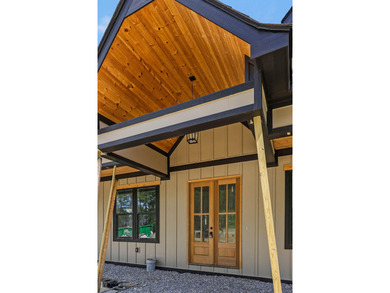 Nestled in the prestigious River Gorge Ranch, this stunning - photo 4