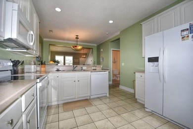 Experience coastal living in this bright and fully furnished - photo 8