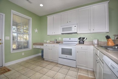 Experience coastal living in this bright and fully furnished - photo 9