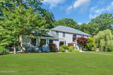 Nestled on a beautifully landscaped 1.05 acre double corner lot - photo 3