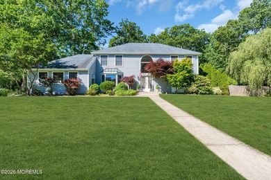 Nestled on a beautifully landscaped 1.05 acre double corner lot - photo 5