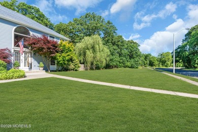Nestled on a beautifully landscaped 1.05 acre double corner lot - photo 8
