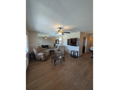 Welcome to this inviting second-floor unit in the desirable - photo 2