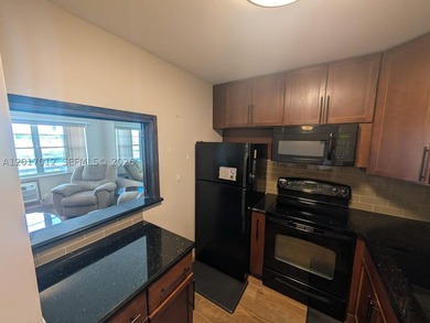 Welcome to this inviting second-floor unit in the desirable - photo 6