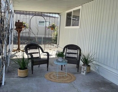 This roomy 1973 manufactured home sits on a quiet cul-de-sac in