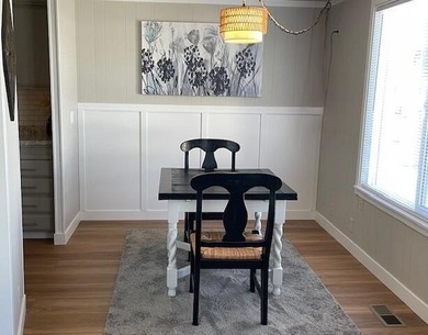 This roomy 1973 manufactured home sits on a quiet cul-de-sac in