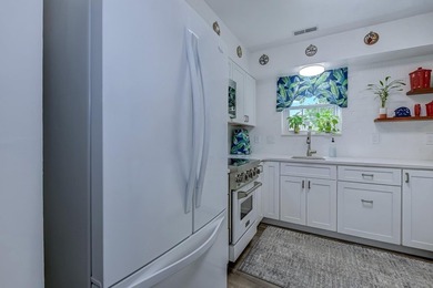 It's A Beauty in the popular 55+ Woodlake Village community - photo 10