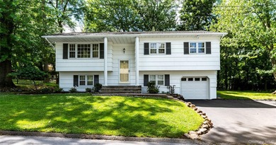 Welcome to this beautifully maintained four-bedroom home nestled - photo 1
