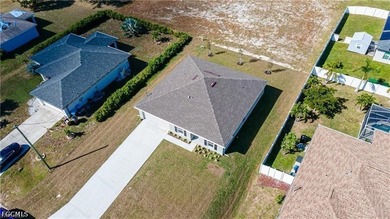 Welcome to this cozy and well-maintained single-family home - photo 3