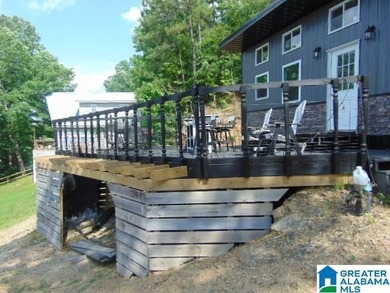 Lakefront Tiny Home with Stunning Views! Step into this charming - photo 11