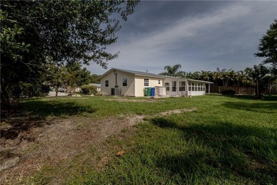 Welcome to this charming 3/2 home on Blossom Dr in Sebastian, FL - photo 2