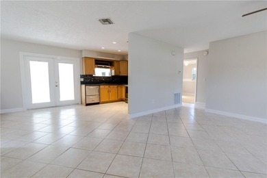 Welcome to this charming 3/2 home on Blossom Dr in Sebastian, FL - photo 3