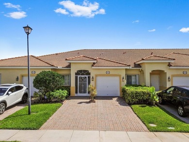 Experience serene lakefront living in this immaculately - photo 1