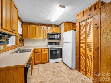 Tucked among the trees in the desirable Riverbend community of - photo 13