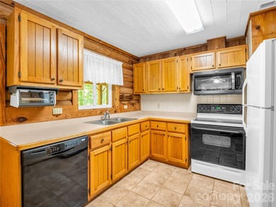 Tucked among the trees in the desirable Riverbend community of - photo 14