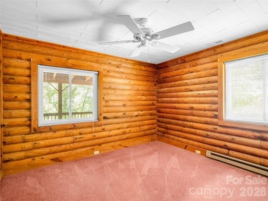 Tucked among the trees in the desirable Riverbend community of - photo 18