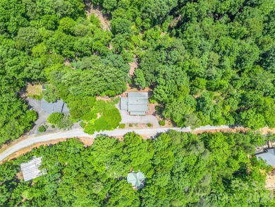 Tucked among the trees in the desirable Riverbend community of - photo 37