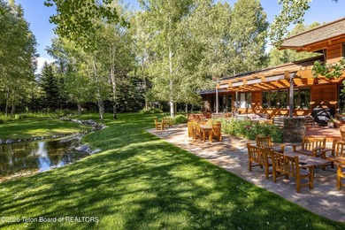 Set on the West Bank of the Snake River in Wilson, this 9 - photo 49