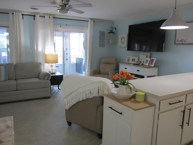Step into your own coastal escape with this beautifully updated - photo 2