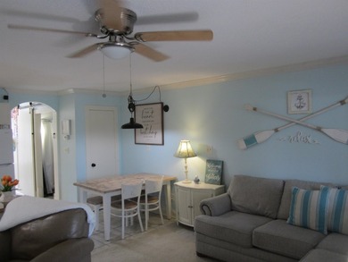 Step into your own coastal escape with this beautifully updated - photo 4
