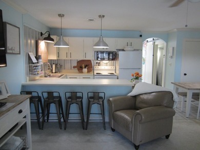 Step into your own coastal escape with this beautifully updated - photo 5