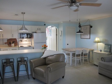 Step into your own coastal escape with this beautifully updated - photo 7