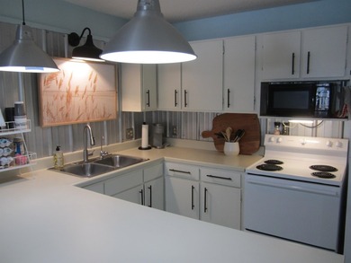 Step into your own coastal escape with this beautifully updated - photo 8