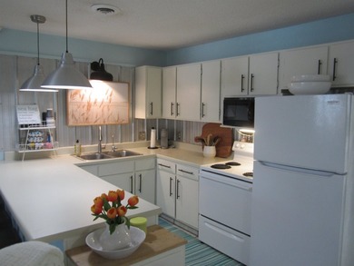 Step into your own coastal escape with this beautifully updated - photo 9