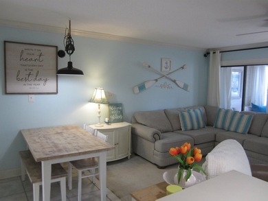 Step into your own coastal escape with this beautifully updated - photo 10