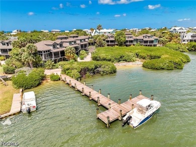 End Unit With Harbor Views & Dock Access! Experience the - photo 1