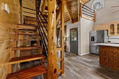 Perched on a scenic hilltop overlooking one of the Twin Lakes - photo 16